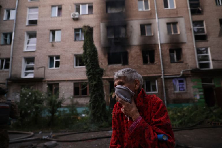 A resident stands near the resident's destroyed home following Russian air strike in Zaporizhzhia, Ukraine, Saturday, Aug. 30, 2025. (AP Photo/Kateryna Klochko)