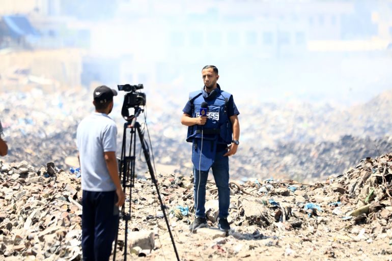 GAZA CITY, GAZA - AUGUST 13: Enes al-Sharif, the Gaza correspondent for the Qatar-based Al Jazeera television, who is targeted by Israeli Army Spokesperson Avichay Adraee, reports on the events in Gaza City, Gaza on August 13, 2024. (Photo by Dawoud Abo Alkas/Anadolu via Getty Images)