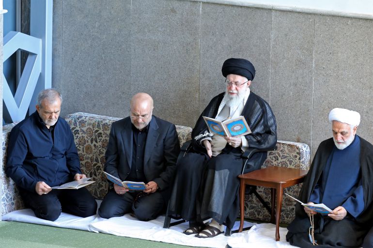 TEHRAN, IRAN - OCTOBER 4: (EDITOR’S NOTE: This Handout image/clip was provided by a third-party organization and may not adhere to Getty Images’ editorial policy.) In this handout image provided by the Iranian Leader's Press Office, Iranian Supreme leader Ali Khamenei (2R) with Iran's President Masoud Pezeshkian (L), Parliament Speaker Mohammad Bagher Ghalibaf (2L) and Judiciary Chief Mohsen Ejeie (R), reading the Koran during the Friday prayer ceremony on October 04, 2024 in Tehran, Iran. Protesters supporting Iran's military position against Israel take to the streets of Tehran after Friday prayers at the Imam Khomeini Grand Mosalla mosque. The Leader of the Islamic Revolution Ayatollah Seyyed Ali Khamenei delivered a public sermon after a commemoration ceremony for the leader of Hezbollah who was killed in an Israeli airstrike in Beirut. (Photo by Iranian Leader's Press Office - Handout/Getty Images)