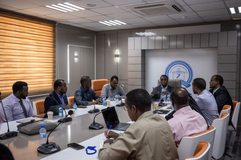 MOGADISHU, SOMALIA - APRIL 23: The chairman of the National Independent Electoral Boundaries Commission (NIEBC), Abdikarim Ahmed Hassan, (centre) hosts a meeting at the office of the National Independent Electoral Boundaries Commission on April 23, 2025 in Mogadishu, Somalia. The country launched the first voter registration drive in over 50 years ahead of presidential elections planned for 2026. The country has long used an indirect, clan-based voting system, but its current president has pledged to implement a one-person, one-vote model. (Photo by Ed Ram/Getty Images)