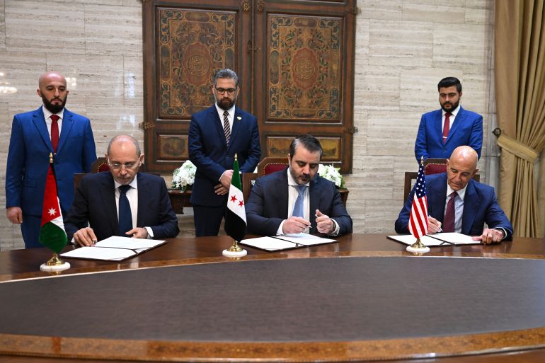 (From L) Jordan's Foreign Minister Ayman Safadi, Syrian Foreign Minister Asaad al-Shaibani and US special envoy for Syria Tom Barrack sign an agreement ahead of a press conference in Damascus on September 16, 2025.