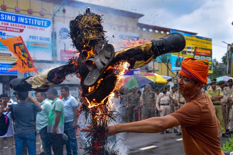 Member of Bajrang Dal, which is a Hindutva militant organisation, are burning effigy of Sankar Prasad Dutta, member of the Communist Party of India, yesterday who made made a comment while addressing a gathering, made a controversial remark referring to Lord Hanuman as 