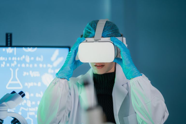 Scientists wearing VR goggles conduct experiments in the laboratory.