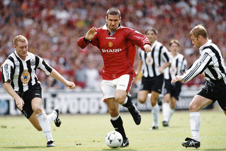 LONDON, UNITED KINGDOM - AUGUST 11: Manchester United player Eric Cantona (c) beats Steve Watson and David Batty (r) during the FA Charity Shield match between Manchester United and Newcastle United at Wembley Stadium on August 11, 1996 in London, England. (Photo by Shaun Botterill/Allsport/Getty Images)