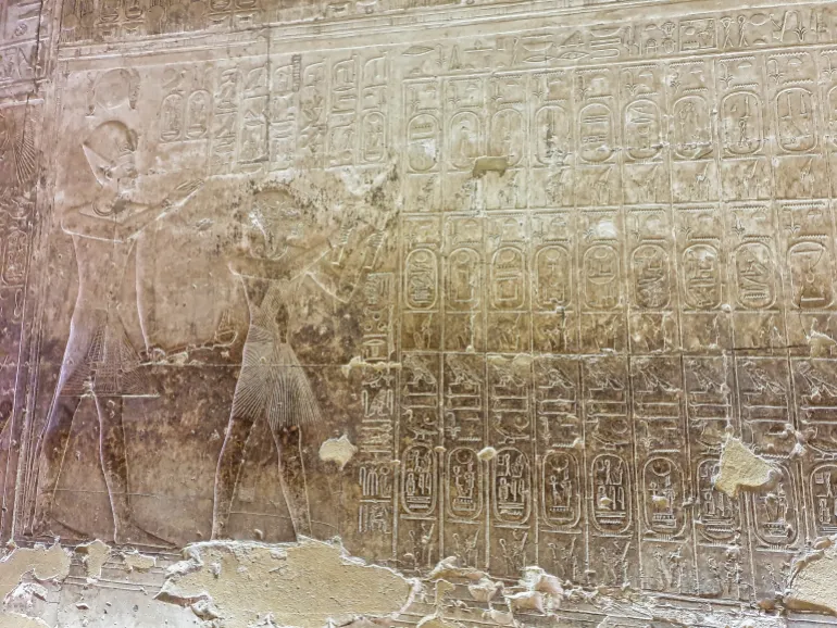 Abydos العرابة المدفونة - أبيدوس Abydos,Egypt,January 2,2020-Abydos Kings List Wall Relief Close up -Famous list of major pharoahs and dynasties of ancient egypt in the Temple of Seti built in 13th century BC by the Pharoah Seti I