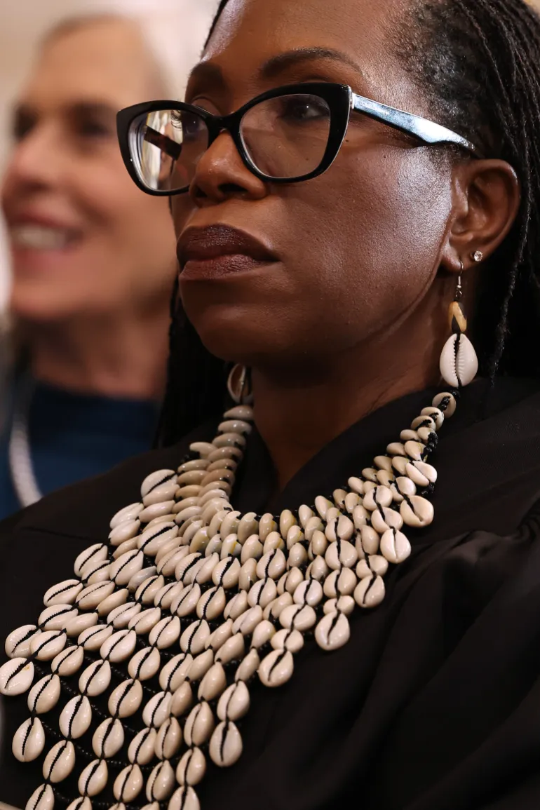 Jan 20, 2025; Washington, DC, USA; WASHINGTON, DC - JANUARY 20: U.S. Supreme Court Associate Justices Ketanji Brown Jackson wears a collar and matching earrings made from cowrie shells during the inauguration ceremonies in the Rotunda of the U.S. Capitol on January 20, 2025 in Washington, DC. Donald Trump took the oath of office for his second term as the 47th president of the United States. Mandatory Credit: Chip Somodevilla-Pool via Imagn Images