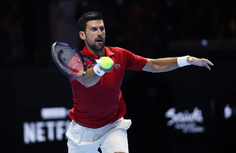 RIYADH, SAUDI ARABIA - OCTOBER 18: Novak Djokovic of Serbia plays a forehand shot during the Men's Single's Third Place match on day three of the Six Kings Slam 2025 at ANB Arena on October 18, 2025 in Riyadh, Saudi Arabia. (Photo by Clive Brunskill/Getty Images)