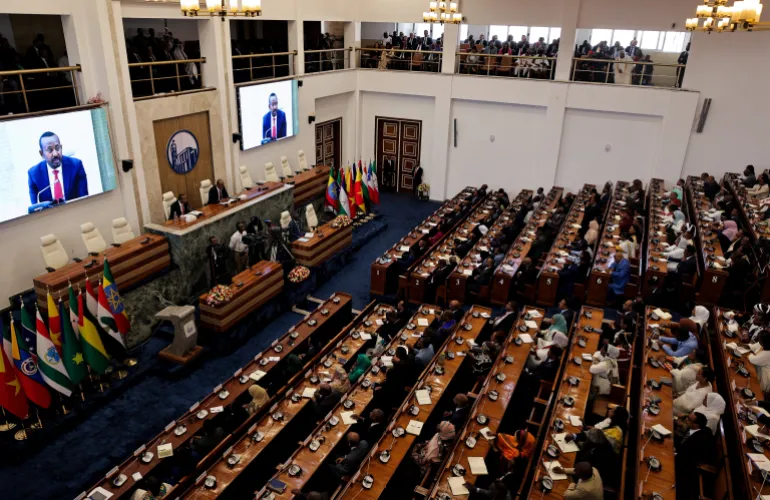 Ethiopia's Prime Minister Abiy Ahmed addresses parliament members on the current situation of the country, at the parliament building, in Addis Ababa, Ethiopia, October 28, 2025. REUTERS/Tiksa Negeri